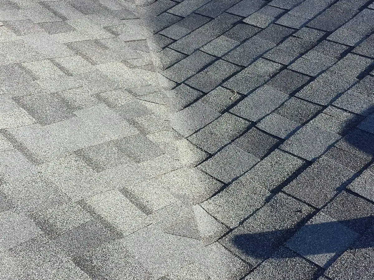 New gray architectural shingles on the same roof after replacement
